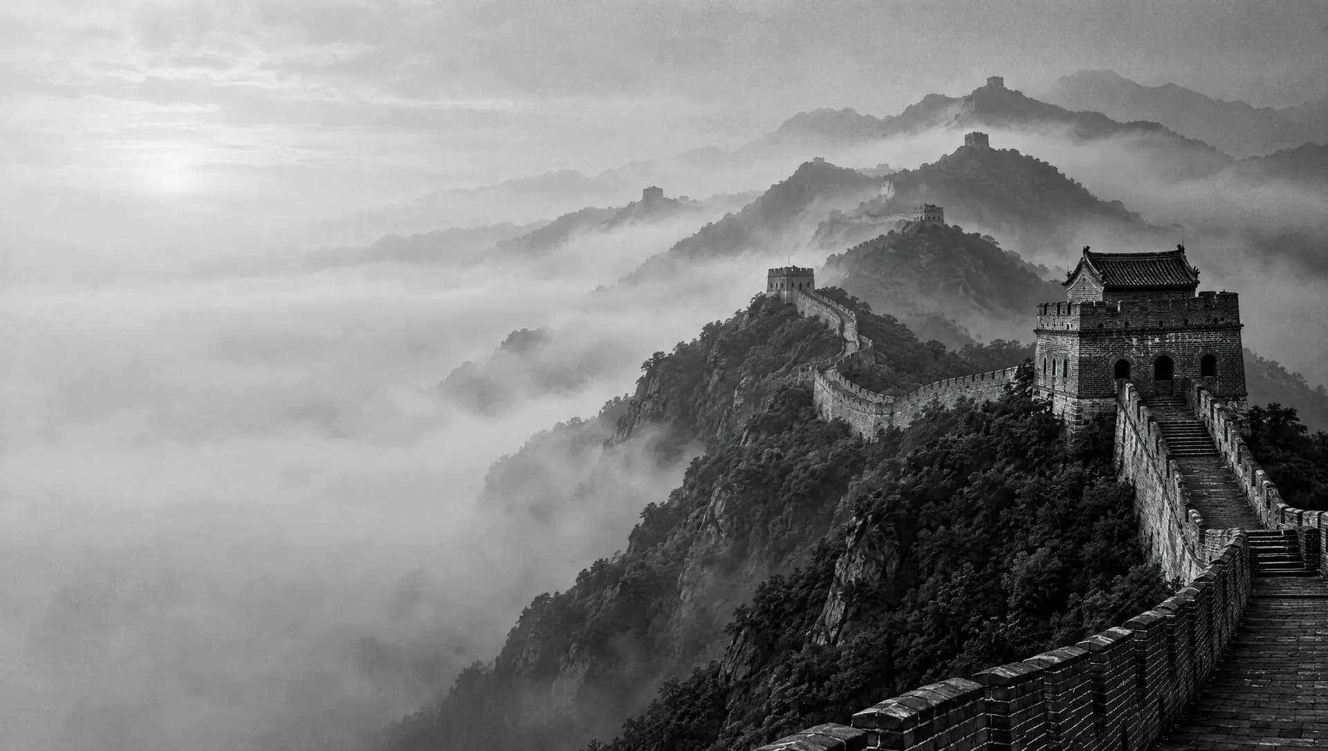 The Great Wall of China winding along a misty mountain ridge